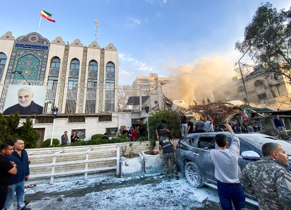 Smoke rises af ter what the Iranian media said was an Israeli strike on a building close to the Iranian embassy in Damascus, Syria April 1, 2024. REUTERS/Firas Makdesi